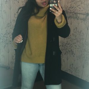 A sweater mustered color